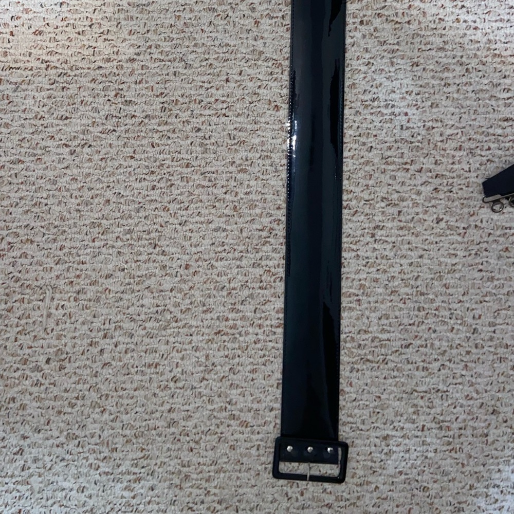 36inches in total length. patent leather  5 hole belt adjusters